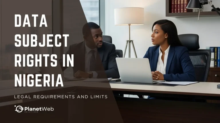Two professionals discussing data subject rights in Nigeria, seated at a desk with a laptop and documents.