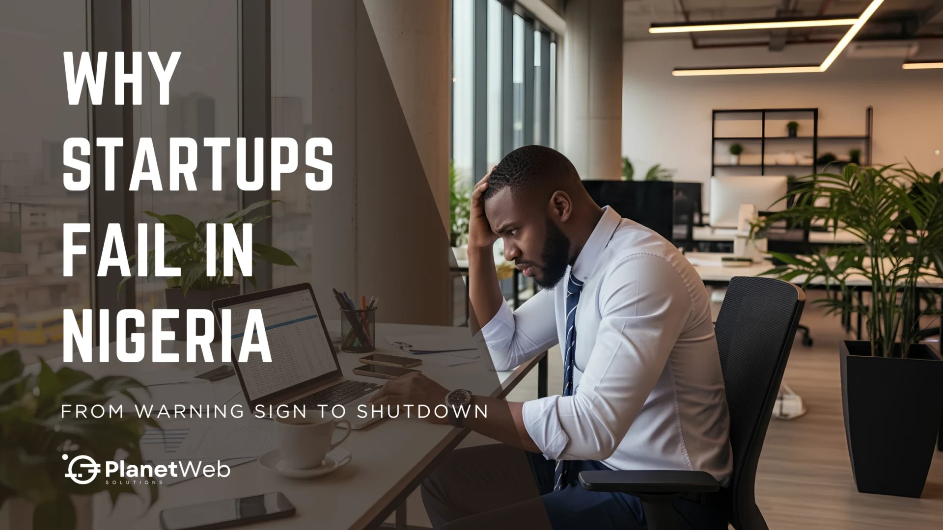 Why startups fail in Nigeria: stressed businessman in modern office.