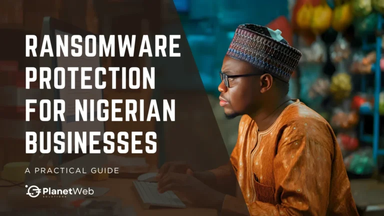 Man in traditional attire researching ransomware protection for Nigerian businesses on a computer.