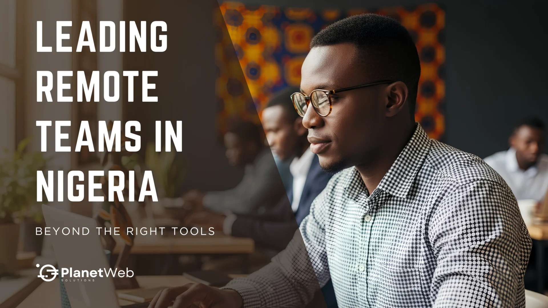 Leading remote teams in Nigeria, featuring a focused professional working at a laptop.